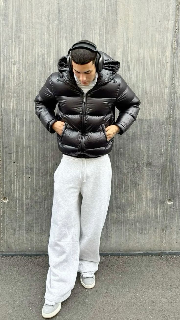 Men's quilted hooded puffer jacket with long sleeves and front zipper