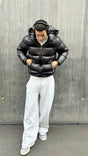 Men's quilted hooded puffer jacket with long sleeves and front zipper