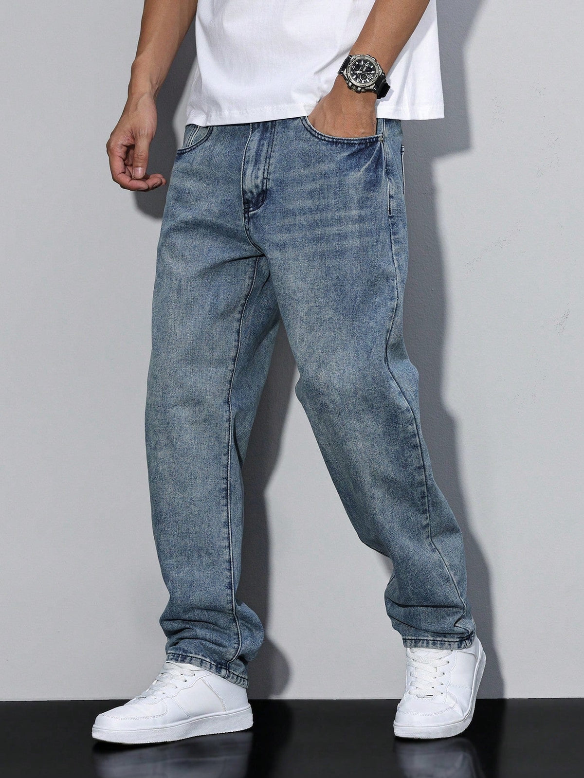 Men's straight leg jeans with a mid-rise waist and full-length legs