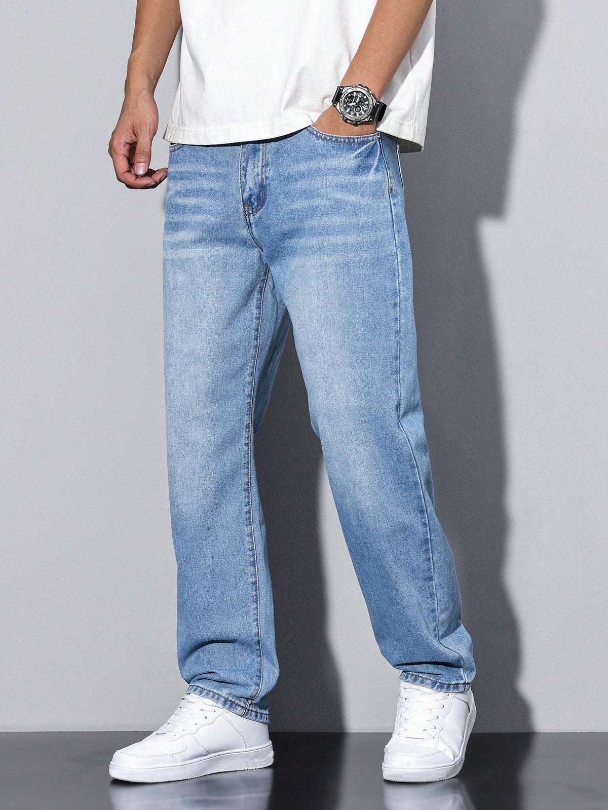 Men's straight leg jeans with a mid-rise waist and full-length legs