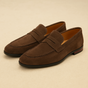 Men's penny loafers with rounded toes, vamp straps and low heels