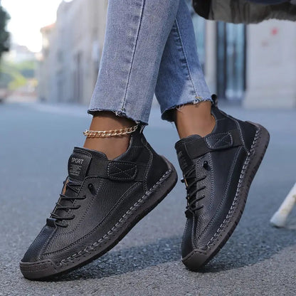 Women's casual lace-up sneakers with strap detail, contrast stitching and flat soles