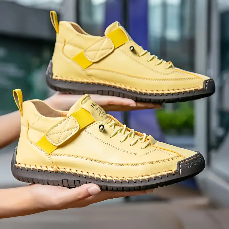 Women's casual lace-up sneakers with strap detail, contrast stitching and flat soles