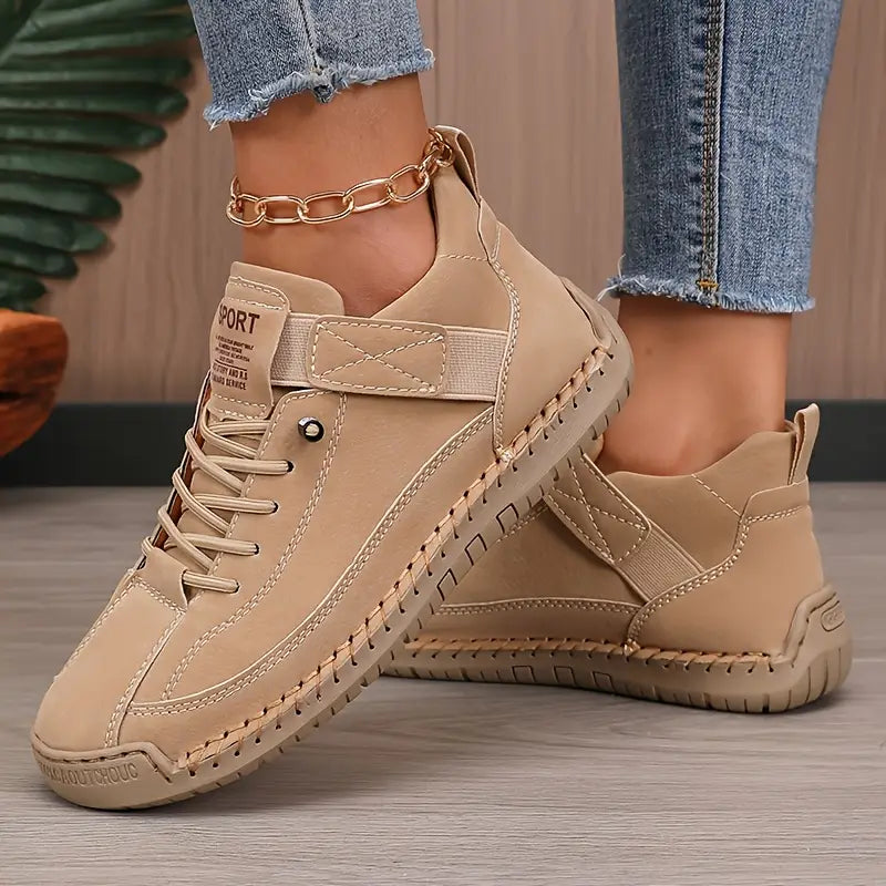 Women's high-top lace-up sneakers with ankle strap and stitched flat sole