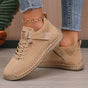 Women's high-top lace-up sneakers with ankle strap and stitched flat sole
