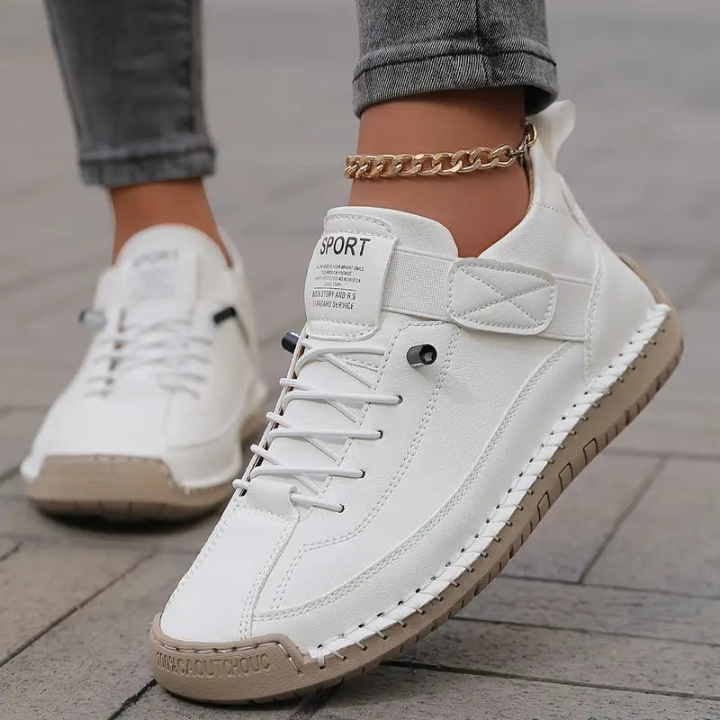 Women's casual lace-up sneakers with strap detail, contrast stitching and flat soles