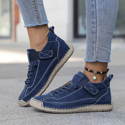 Women's casual lace-up sneakers with strap detail, contrast stitching and flat soles