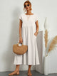 Women's flowing midi dress with round neck and short sleeves, shown in white and navy