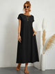 Women's flowing midi dress with round neck and short sleeves, shown in white and navy