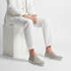 Men's plain slip-on loafers with moc toe stitching and flat light-coloured soles