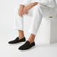 Men's plain slip-on loafers with moc toe stitching and flat light-coloured soles