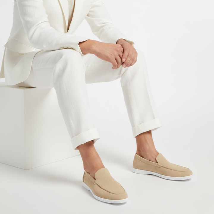 Men's plain slip-on loafers with moc toe stitching and flat light-coloured soles