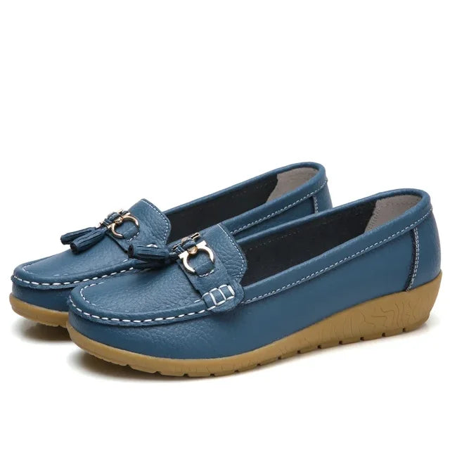 Women's moc toe loafers with tassel and metal details
