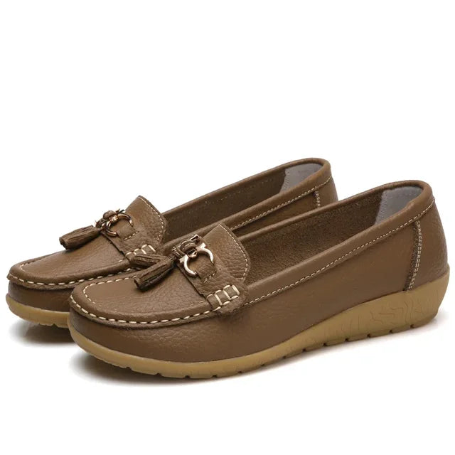 Women's moc toe loafers with tassel and metal details