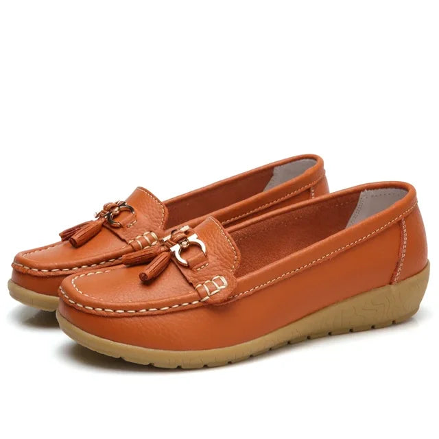 Women's moc toe loafers with tassel and metal details