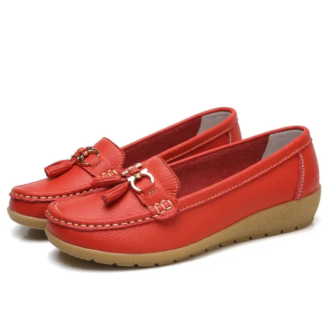 Women's moc toe loafers with tassel and metal details