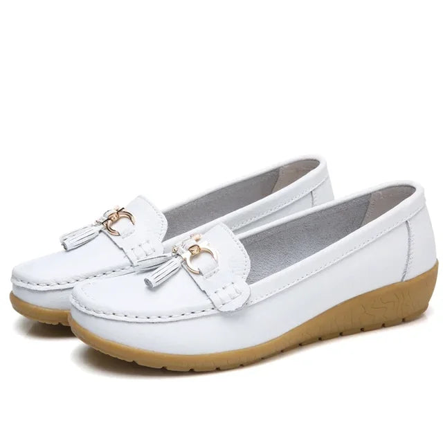 Women's moc toe loafers with tassel and metal details