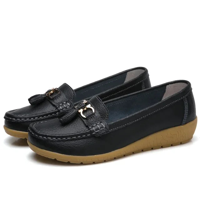 Women's moc toe loafers with tassel and metal details