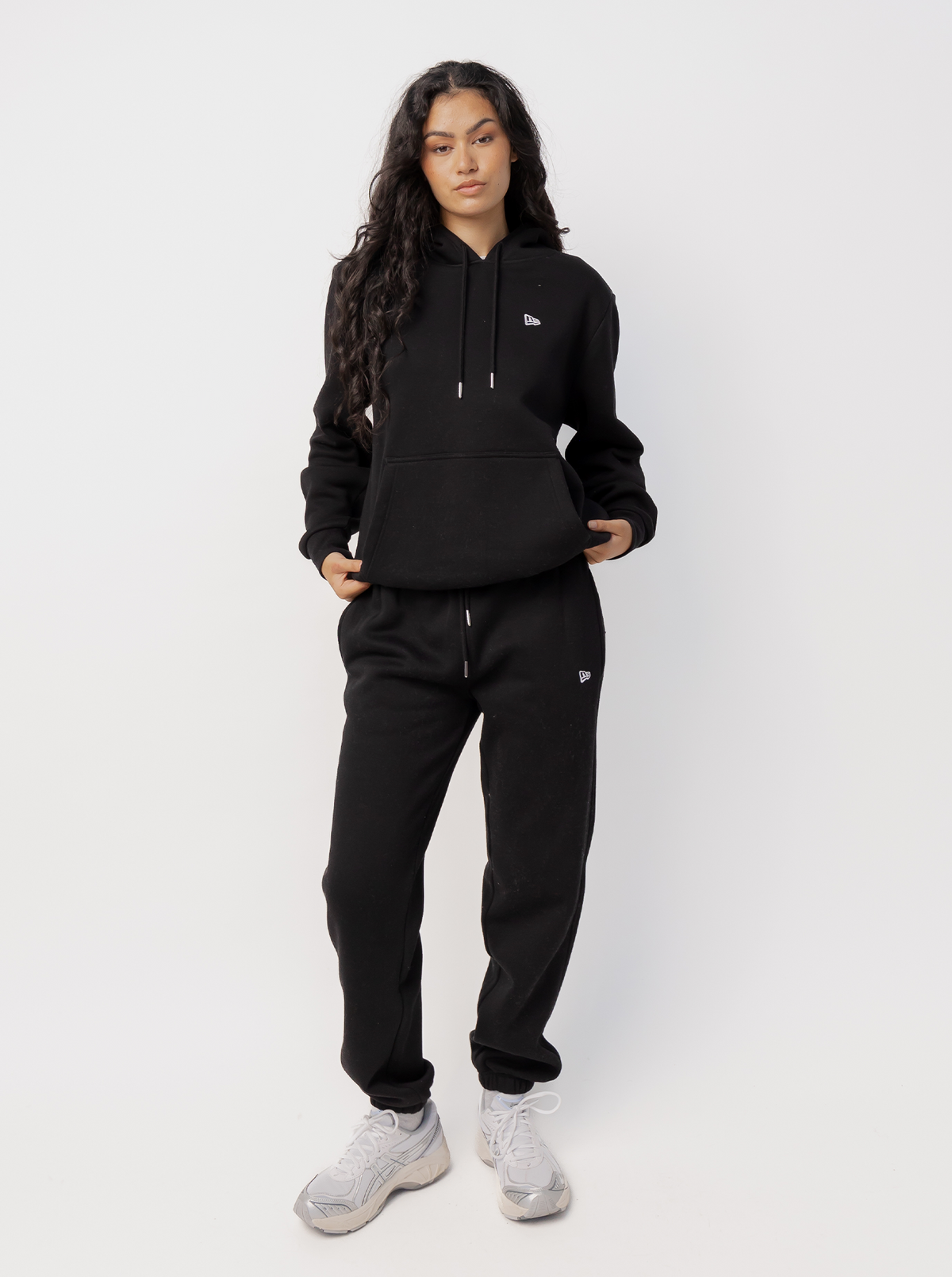 Women's black tapered logo jogger pants with drawstring waist and elasticated cuffs