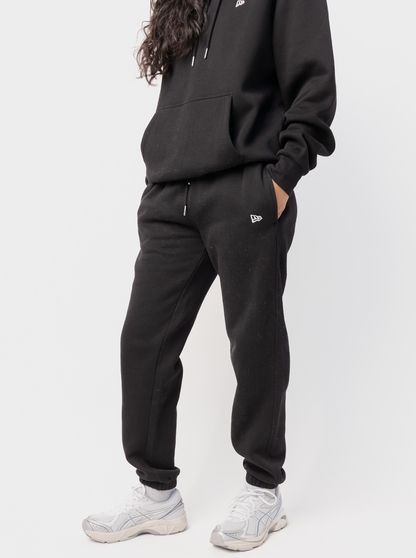 Women's black tapered logo jogger pants with drawstring waist and elasticated cuffs