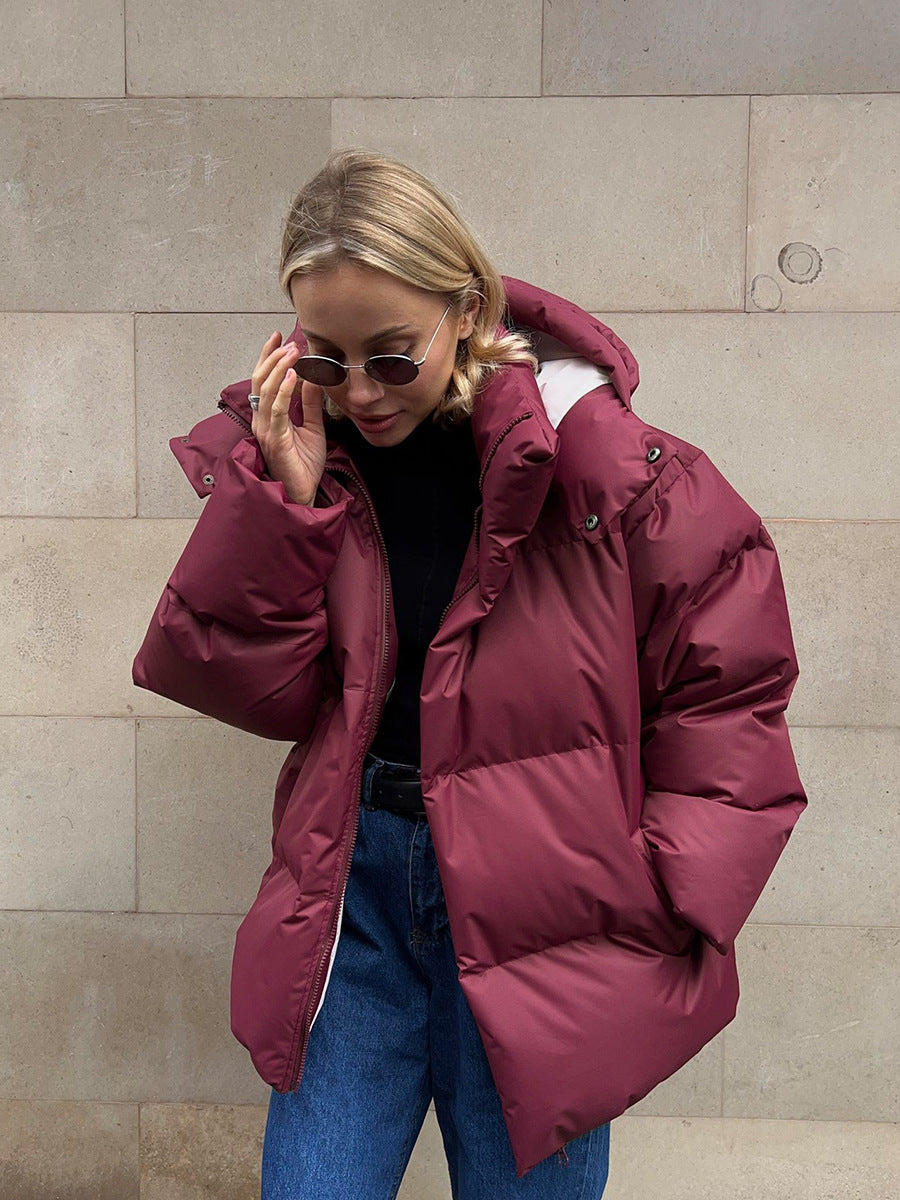 Women's oversized hooded puffer jacket with quilted panels