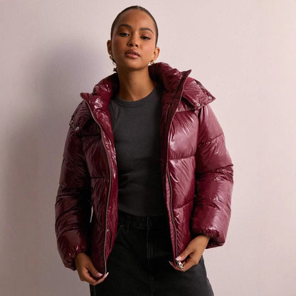 Women's glossy quilted hooded puffer jacket with front zipper and side pockets
