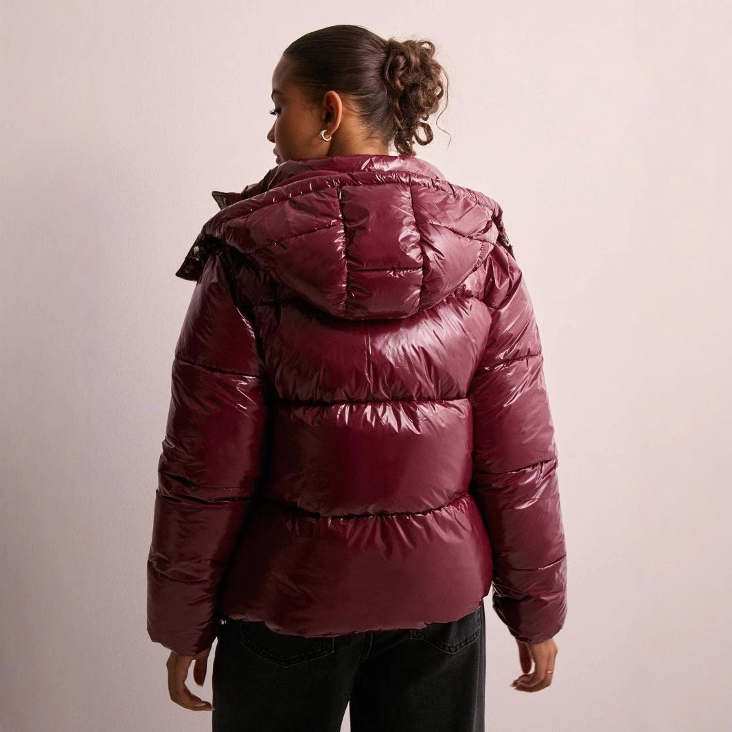 Women's glossy quilted hooded puffer jacket with front zipper and side pockets