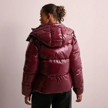 Women's glossy quilted hooded puffer jacket with front zipper and side pockets