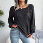Women's textured knit sweater with diamond pattern, long sleeves and shoulder buttons