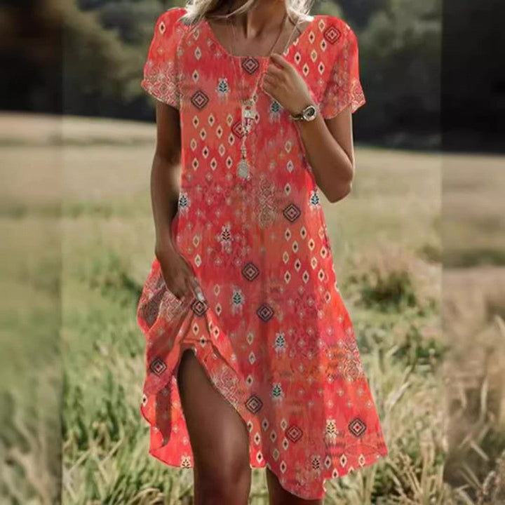 Women's summer midi dress with small white dot print and short sleeves