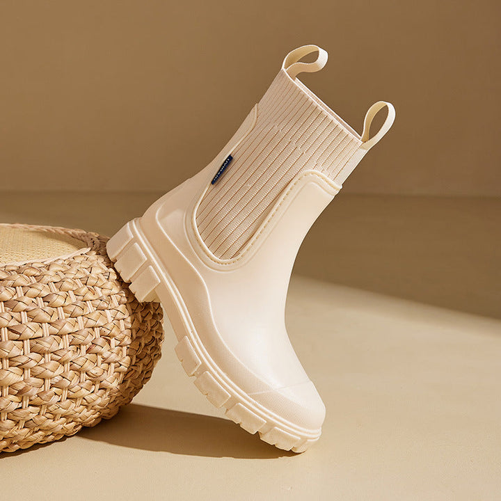 VALERIE waterproof ankle boots with chunky lug sole and ribbed collar, pull handles