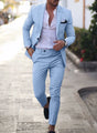 Men's textured two piece suit with notched lapel blazer and tapered trousers