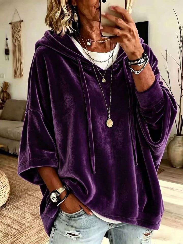 Women's oversized hoodie with drawstring hood and wide sleeves