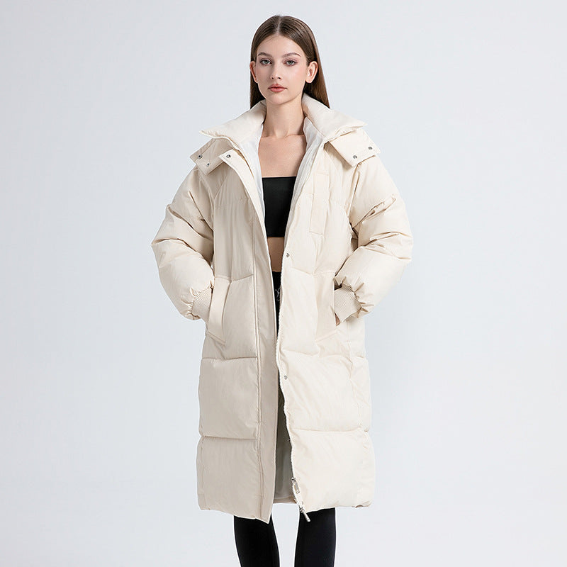Women's long hooded puffer coat with quilted panels