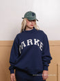 Women's oversized varsity sweatshirt with mock neck and front lettering