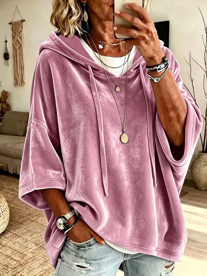 Women's oversized hoodie with drawstring hood and wide sleeves