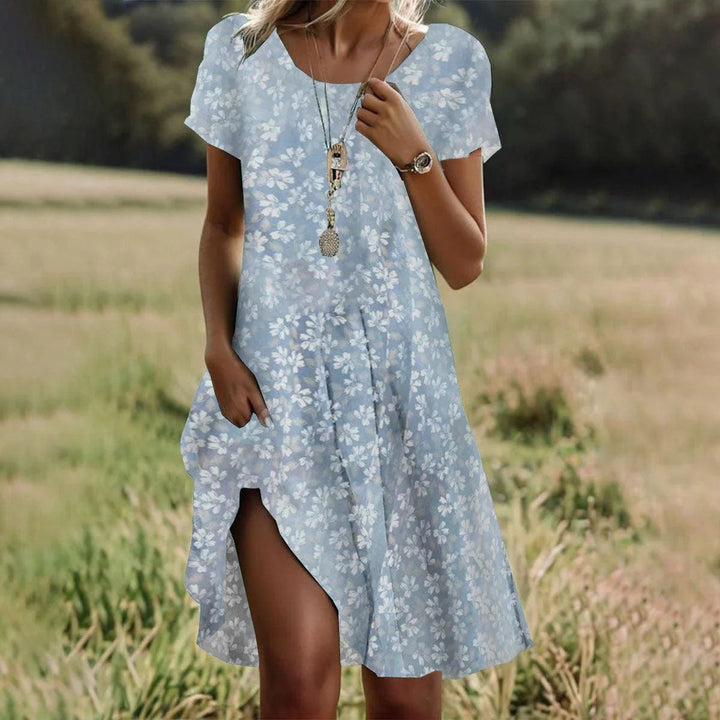 Women's summer midi dress with small white dot print and short sleeves