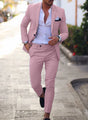 Men's textured two piece suit with notched lapel blazer and tapered trousers