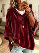 Women's oversized hoodie with drawstring hood and wide sleeves