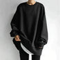 Women's oversized crew neck tunic sweater with long sleeves and ribbed trims