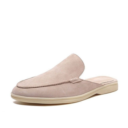 Moc toe slip-on loafers with stitched trim and low flat soles