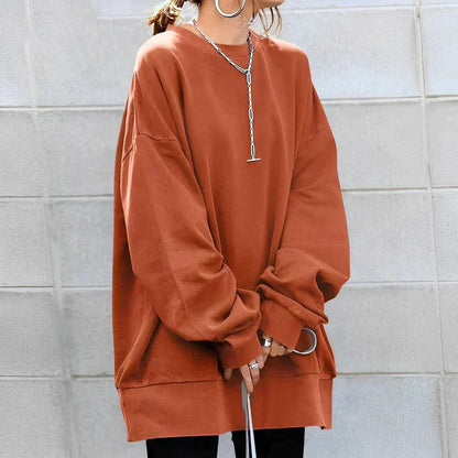 Women's oversized crew neck tunic sweater with long sleeves and ribbed trims