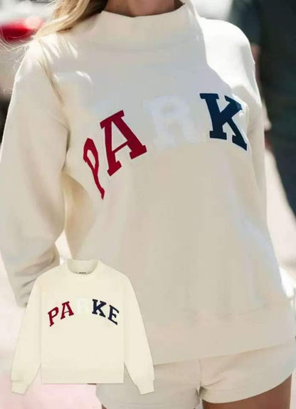 Women's oversized varsity sweatshirt with mock neck and front lettering