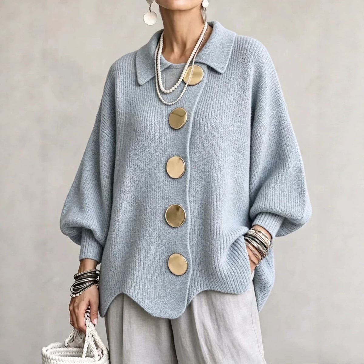 Women's oversized ribbed button-front cardigan with collared neckline and long sleeves
