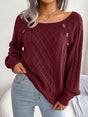 Women's textured knit sweater with diamond pattern, long sleeves and shoulder buttons