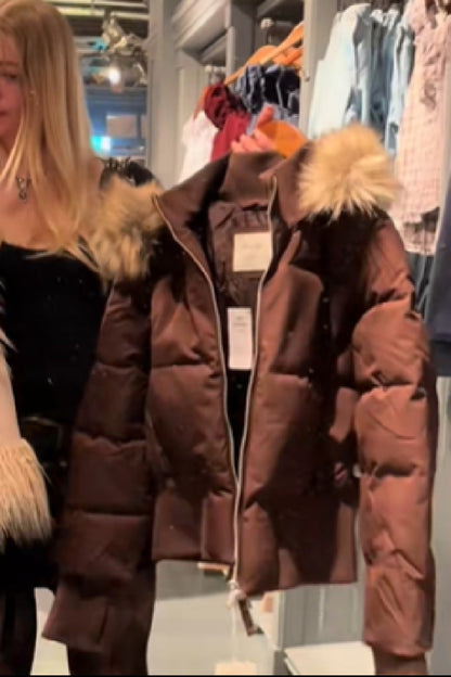 Women's quilted hooded puffer jacket with zip front and ribbed trims
