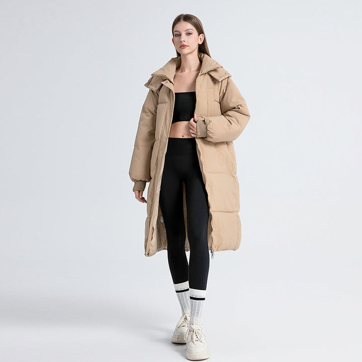 Women's long hooded puffer coat with quilted panels
