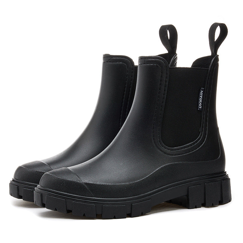 Women's waterproof chelsea ankle boots with chunky lug sole and pull loops, shown in pink and black