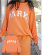 Women's oversized varsity sweatshirt with mock neck and front lettering