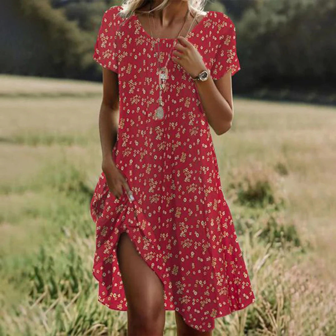 Women's summer midi dress with small white dot print and short sleeves